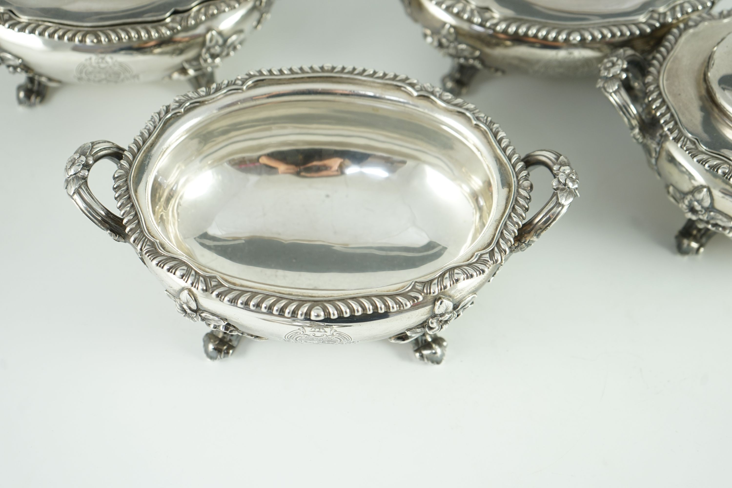 A good set of four Victorian silver two handled oval sauce tureens and covers, by Edward & John Barnard